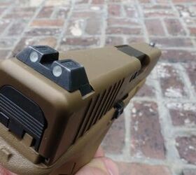 concealed carry corner the only 5 excusable upgrades for a carry glock, Factory Glock 3 dot night sights with white outlines on the Glock 19X