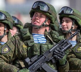 AK-74M rifles with under-barrel grenade launchers and what look to be Valdai red dot sights.