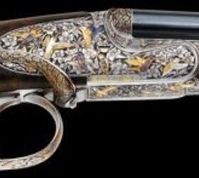 Note the hummingbirds engraved and gold inlaid all over the rifle.