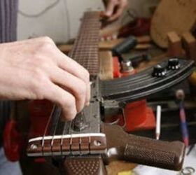 Craftsmen converts AK47 rifle into guitar