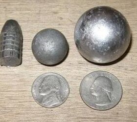 8 bore ball (middle), approx. 3500 grain 2 Bore ball (right)