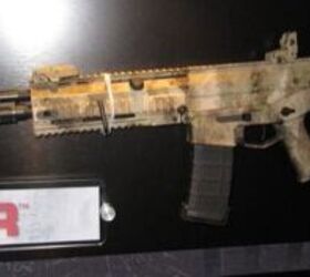 bushmaster acr in a tacs camo
