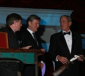 Franco Beretta presents Bush with shotgun