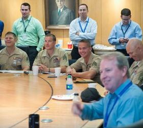 The author, the United States Marine Corps Shooting Team, and Leupold brass in their executive meeting room. 