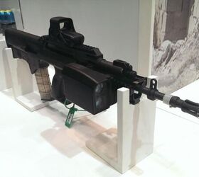 DSEi 13: STK Airburst 40mm Under Barrel Grenade Launcher