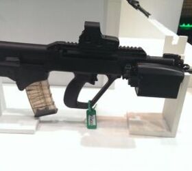 DSEi 13: STK Airburst 40mm Under Barrel Grenade Launcher ...