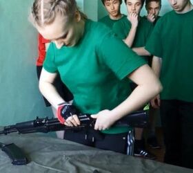 Russian Students Field Strip an AK