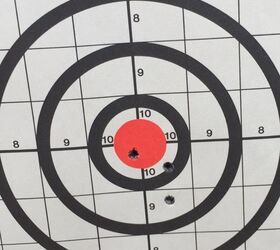 Stock rifle with PWS FSC.  Pretty close to 1 MOA; maybe 3/4 low and 1/4 right from point of aim.