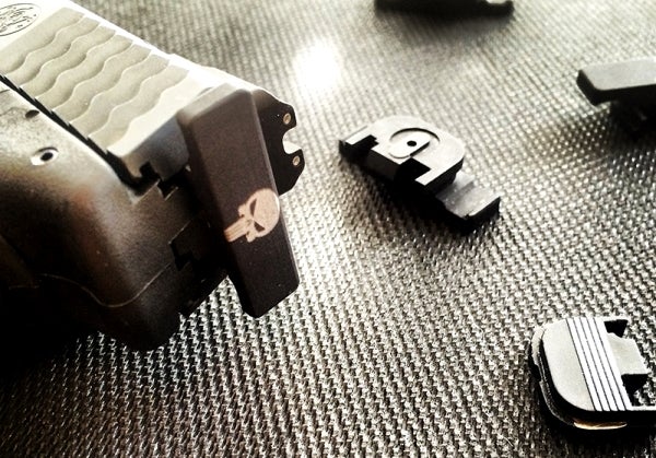 One Hand Slides TacRack for One-Handed Slide Racking | thefirearmblog.com