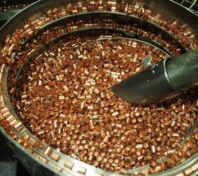 A container of jackets in the stages of forming.