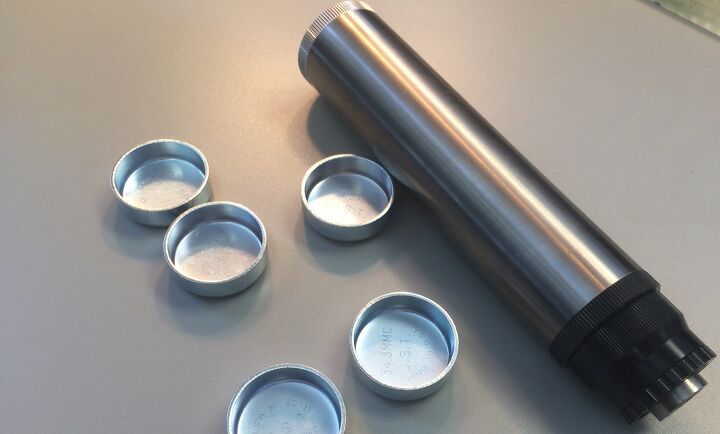 Before: My 1.5 titanium tube with baffles formed from steel freeze plugs and an aluminum end cap. This is a short freeze plug build for a 9mm pistol.