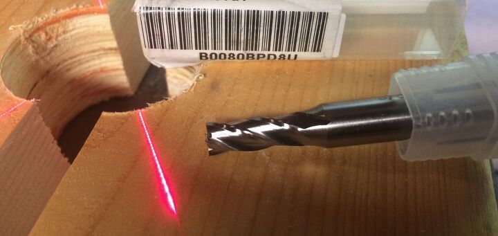 An end mill I picked up from Amazon for about $20. Regular drill bits will work, but an end mill will last longer, especially when cutting titanium.