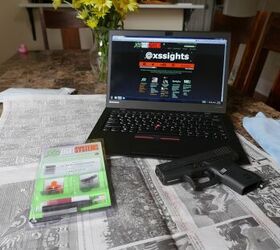 Ready to punch (the old sights out) and screw (the new sights in).