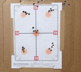 Target (Holes at top center are from ranging shots to adjust for impact difference for 50yards vs zero distance)