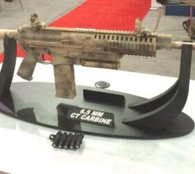 BACK TO THE FUTURE? Textron Displays Newest Polymer-Cased Telescoped Firing Rifle