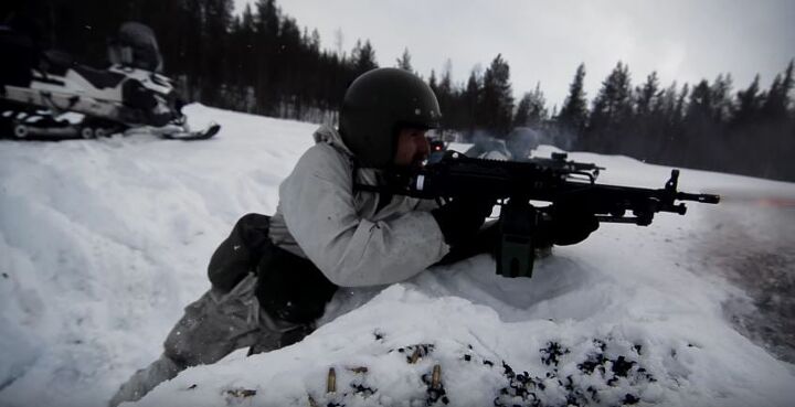 Swedish Arctic Rangers fighting from snowmobiles | thefirearmblog.com