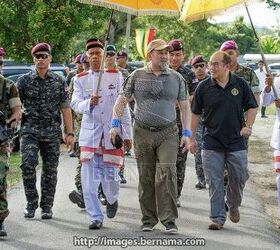 Malaysian Head of State Shoots Pistol Competition