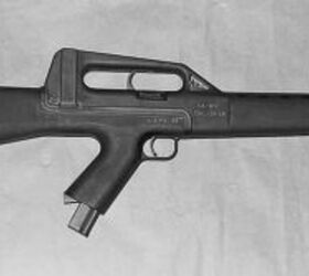 The CA MOD.02 prototype was distinguishable from the semi-auto model by the larger capacity magazine in the pistol grip and the curved shape of the cocking lever within the carry handle.