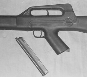 Closer view of the selective-fire CA MOD.02 shows the disc-shaped fire selector with the markings 'S' (front), '1' (top), and '30' (rear) displayed in a 180 degrees arc.