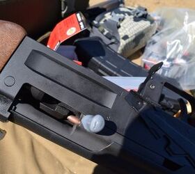 The result of the Tapco magazine malfunction. Round is stuck to the left of the bolt carrier.