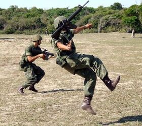 BANG! I Just couldn't help using this photo of a very enthusiastic marine being 'shot', Hollywood-style, in a training exercise. Oh, yes, we're still talking about the M16A2 rifle, here...