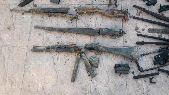 An AK-Lee-Enfield and other assorted parts, what can you identify? (News Group Newspapers Ltd)