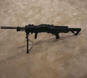 cased telescoped 5 56mm and 7 62mm machine guns from textron on display at ausa