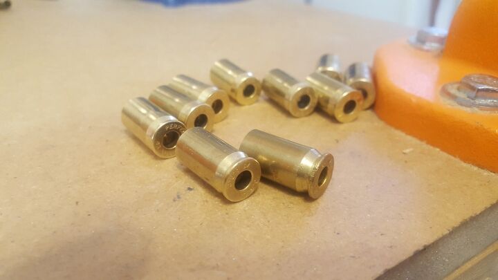Resized and deprimed brass. These took me 30 seconds. Note the front right casing. minor head damage, but it should still feed fine