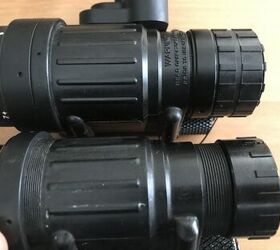 This is what an objective lock ring looks like. The top one has it and the bottom one does not.