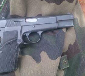 A friend's Browning HP pistol that kept author safe in some parts of South Africa.