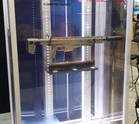 The HK booth's Textron Display with rifle, ammo and weight representative ammo cans (Courtesy of Jervis)