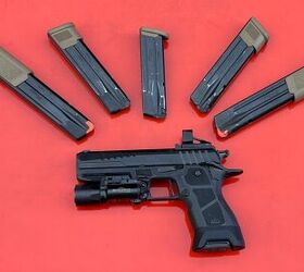 OA 2311 surrounded by P320 magazines