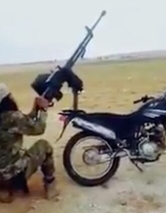 DShK Heavy Machine Gun Mounted on Motorcycle Rear Seat | thefirearmblog.com