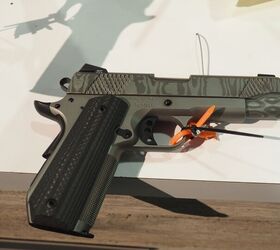 Titanium/damascus compact