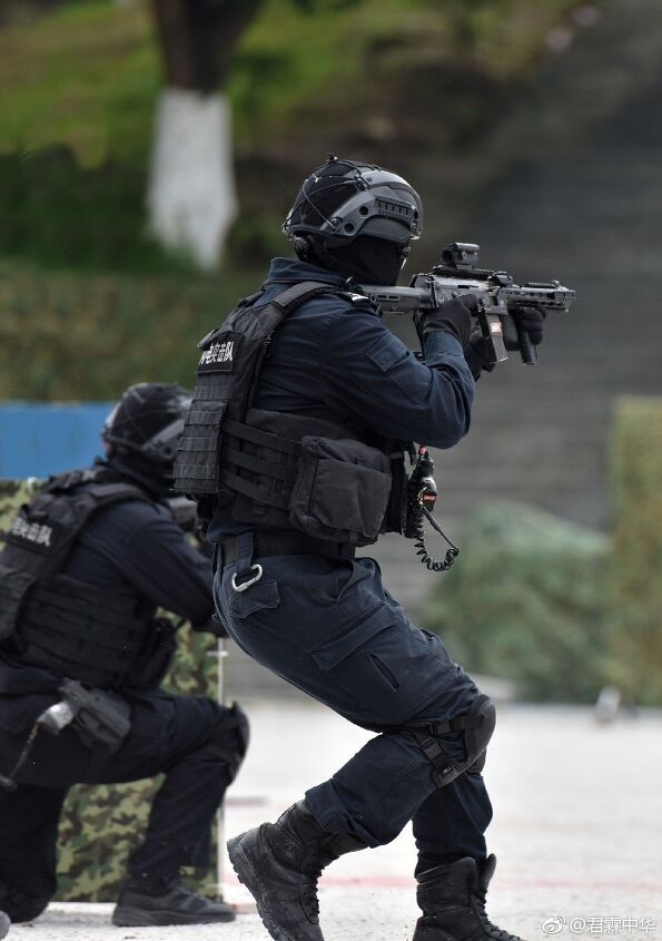 Chinese SWAT with Modded Type 79 Submachine Guns | thefirearmblog.com