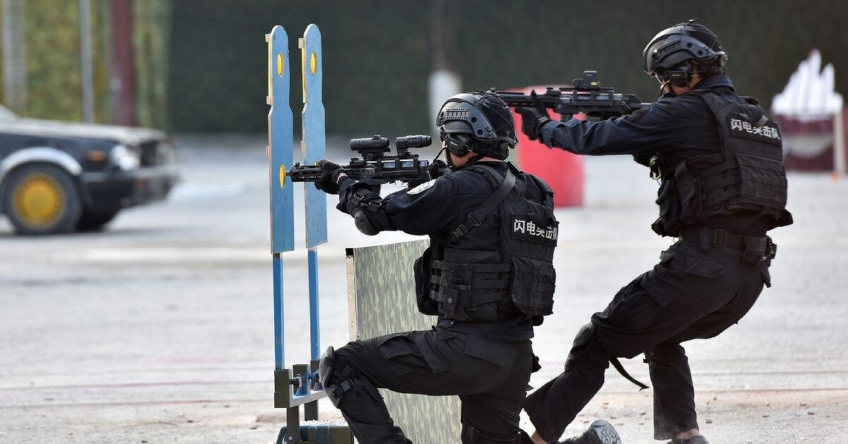 Chinese SWAT with Modded Type 79 Submachine Guns | thefirearmblog.com