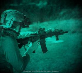 Here we see a white phosphorous image. There is still a green tint but the image is significantly brighter than the standard green provides.Source: https://tnvc.com/shop/tnvpvs-14-l3-gen3-un-filmed-white-phosphor-2/