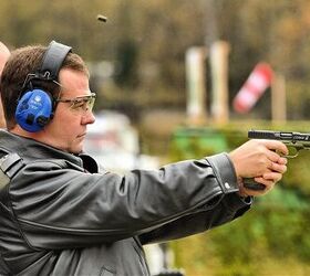 Former Russian president and current Prime Minister Dmitri Medvedev shooting Strike One pistol, October 3, 2012. Picture courtesy of Arsenal Firearms.