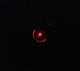 The glare you see through the front lens on the maximum brightness setting, Aimpoint Micro T-2