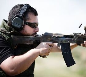 Author, shooting modified AK-74M with Aimpoint T-1 Micro mounted on the upper handguard. 