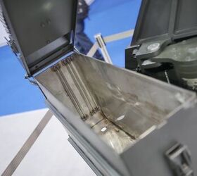 The ammunition case has different slots on the sides for different calibers of ammunition, from 7.62x51mm NATO to 40x53mm grenades. Simply take out or insert a panel for a snug fit in the ammunition box -Miles V, Indo Defense 2018.