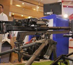 The charging handle has to be rotated up before it can be yanked to the rear and charge the machine gun -Miles V, Indo Defense 2018