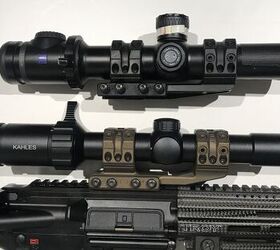 Kahles K18i versus Zeiss Victory V8 1.1-830 (36 mm tube). The Zeiss has an optional ballistic tower and a custom throw lever.