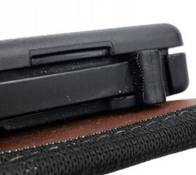 Rotate the lever down and you lock the mag pouch in place.