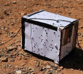 A bullet-ridden box used as a target during a Smart Shooter sighting device familiarization range near At-Tanf Garrison, Syria, May 30, 2020. (DoD/Staff Sgt. William Howard)