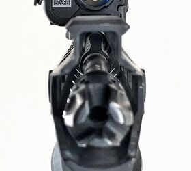 With the lasers centered over the bore, you cannot mount anything in front of it.