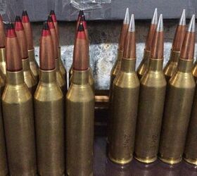 12.7x114HL ammunition loaded with B-32 (API) and Hornady A-MAX bullets.