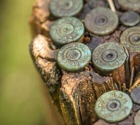 Old Alaskan Tree Stump Loaded with Empty Cases | thefirearmblog.com