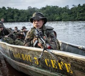 POTD: Guyana – Machine Guns in Canoe