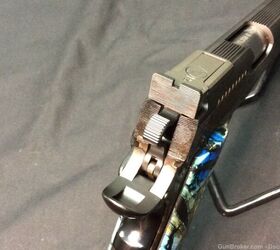 HOT GAT or FUDD CRAP? Is this Mammoth Tusk Clad 1911 a Monster or